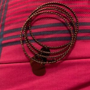 4 twisted bracelets with dangle